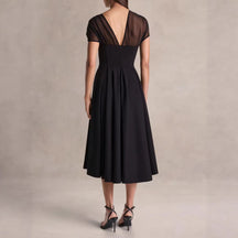 Schwarzes Mesh-Midikleid Rückenansicht – Sévea