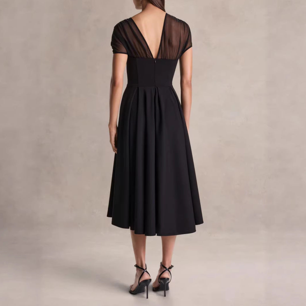 Schwarzes Mesh-Midikleid Rückenansicht – Sévea